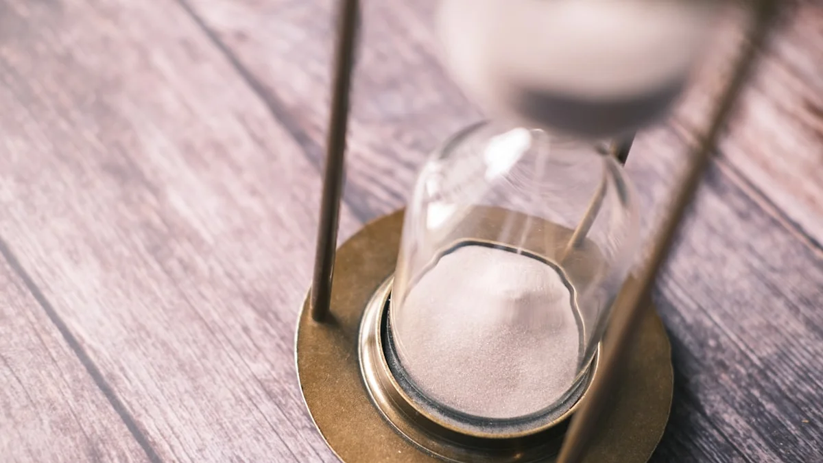 White sand accumulates in the lower bulb of a brass hourglass on weathered wood. — a The Obsidian Key guide to Compounding Begins Near Day 5: The Days Grow Dense.