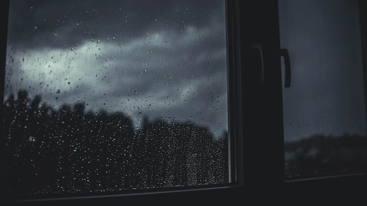 Rain streaks a dark window pane under heavy gray storm clouds. — a The Obsidian Key guide to Bad Day? Why the Evening Replay Needs It Most.