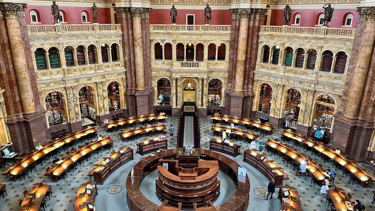 A grand domed library reading room with warm lamps over curved wooden desks. — a The Obsidian Key guide to Best Money Mindset Books for Learning Receiving.