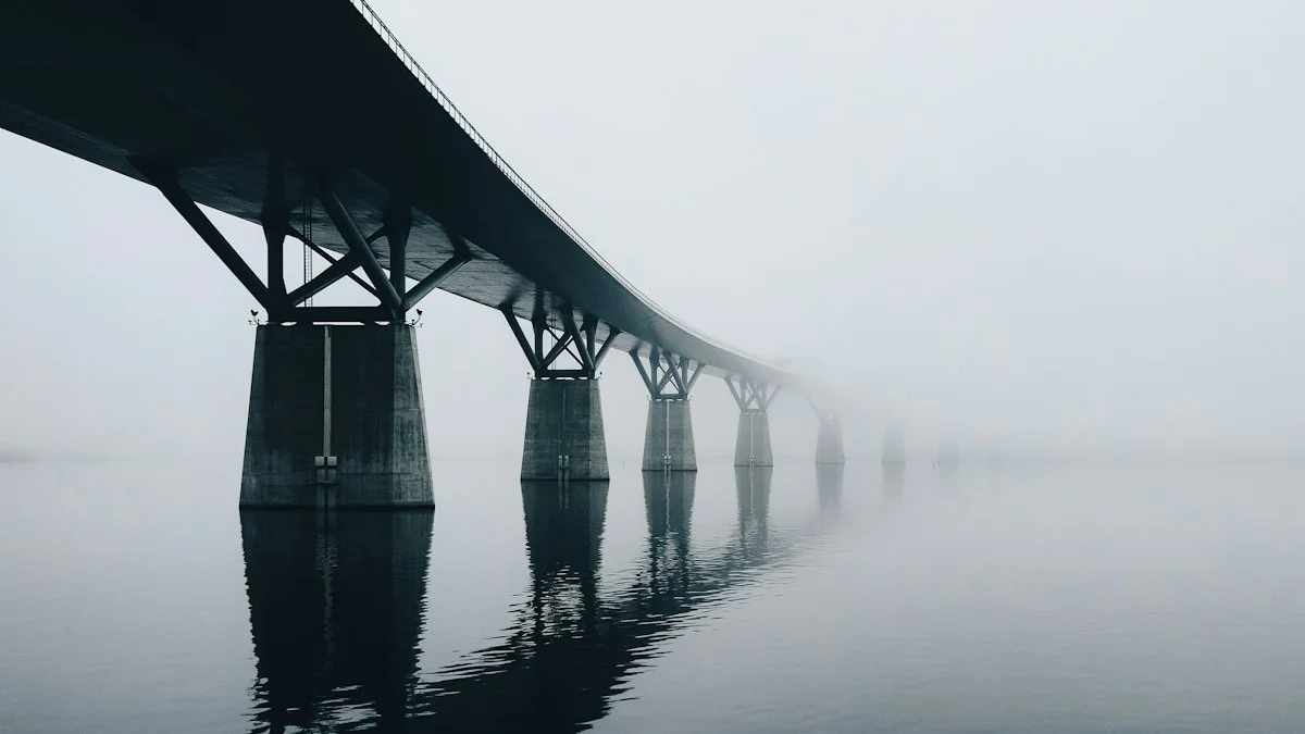 A long bridge runs through morning mist above still, dark water. — a The Obsidian Key guide to Ending the Vow: Closeness Without the Script.