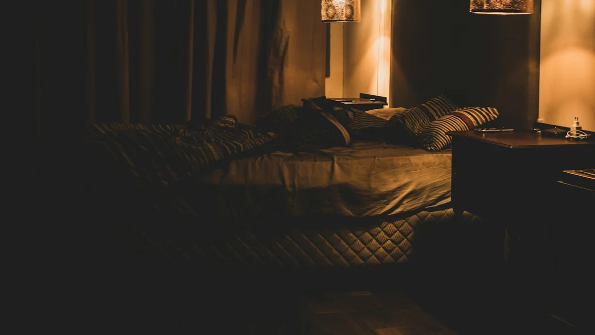 Two small lamps glowing above a bed in a dim quiet bedroom at night. — a The Obsidian Key guide to The Minimum Evening: a Ritual for Interrupted Nights.