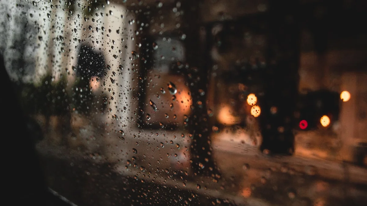 Raindrops on a dark window with warm city lights blurred behind the glass. — a The Obsidian Key guide to Is The Obsidian Key Worth It? An Honest Look.