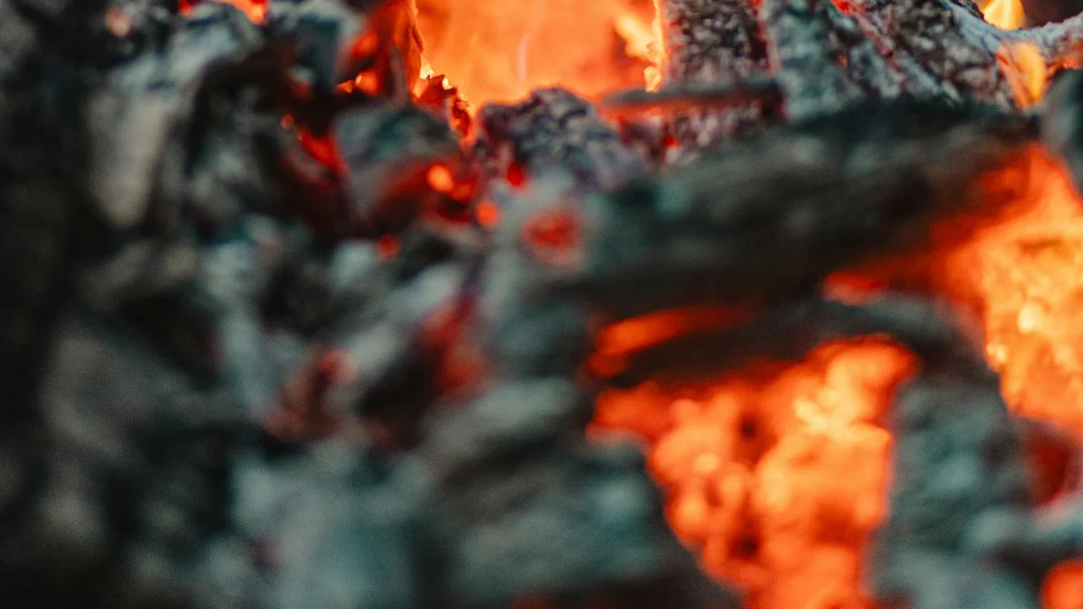 Two dark taper candles burning in brass holders in a dark room. — a The Obsidian Key guide to Kept, Closed, Mine: the One Breath Evening Close.