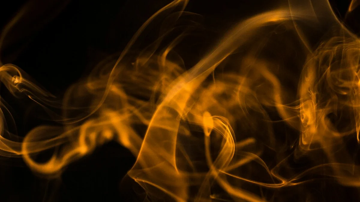Glowing amber incense smoke rising against the dark. — a The Obsidian Key guide to The Monthly Maintenance Cleanse.