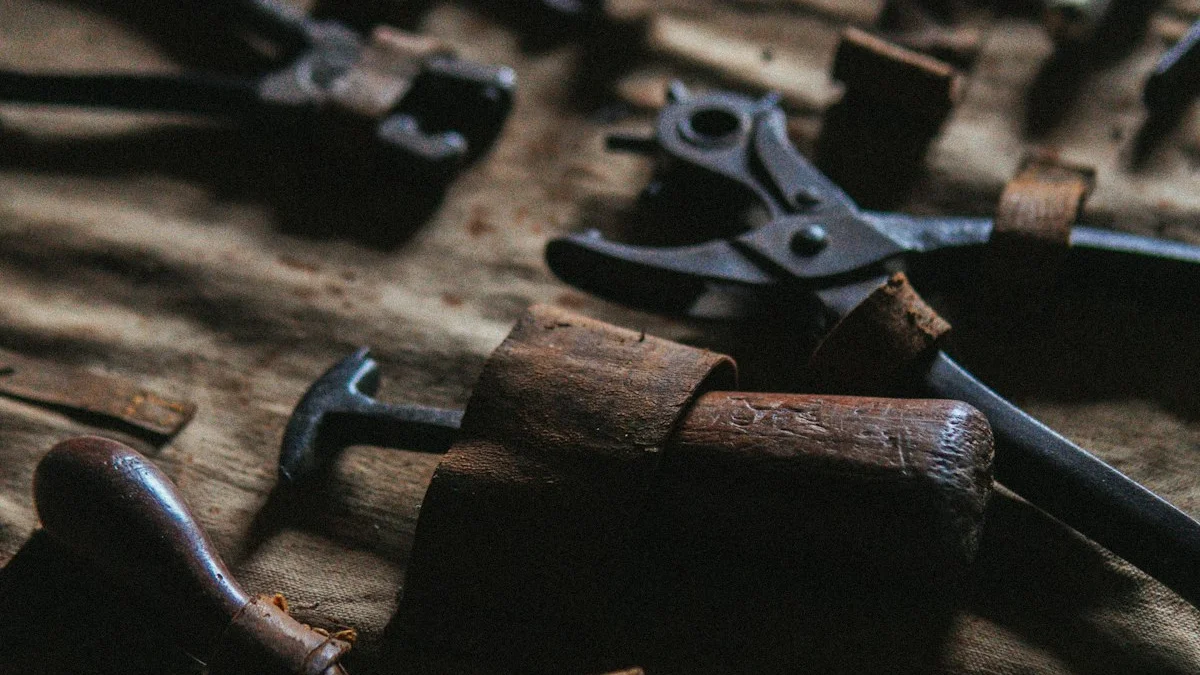 Worn workshop tools with leather straps resting on rough canvas. — a The Obsidian Key guide to The Objects That Hold the Practitioner.