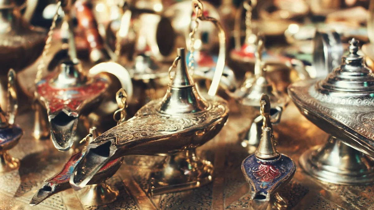 Ornate brass and copper oil lamps crowd a warm market table. — a The Obsidian Key guide to The Obsidian Key on Money: What Part Two Teaches.