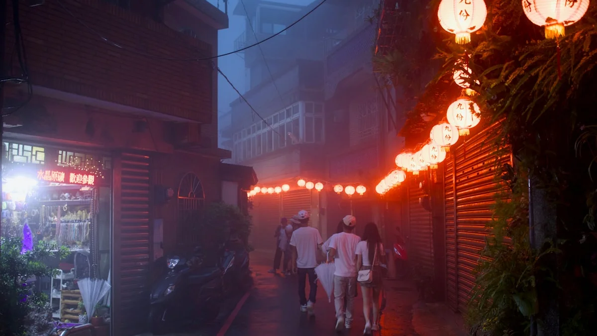 People walking down a foggy street at night lined with glowing red lanterns. — a The Obsidian Key guide to The Seven Failures Chapter of The Obsidian Key.