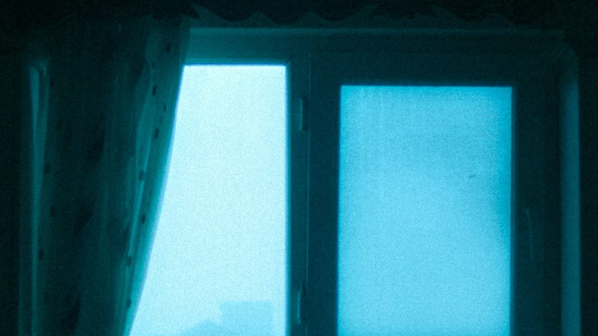 A lace curtain hangs in a dark room beside a window glowing with the last blue light of dusk. — a The Obsidian Key guide to Rooms That Bill You: Reading the Residue of Spaces.