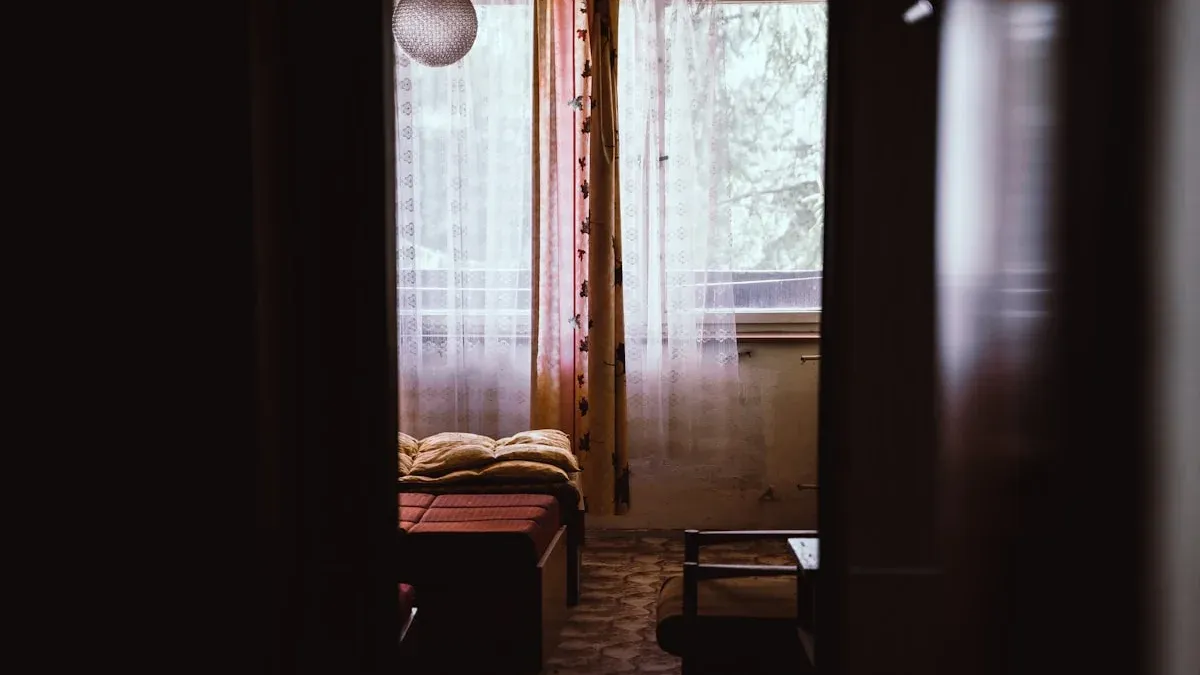 A quiet old bedroom with a daybed and lace curtains seen through a dark doorway. — a The Obsidian Key guide to The Man Who Sat Still at Dawn and Would Not Explain.
