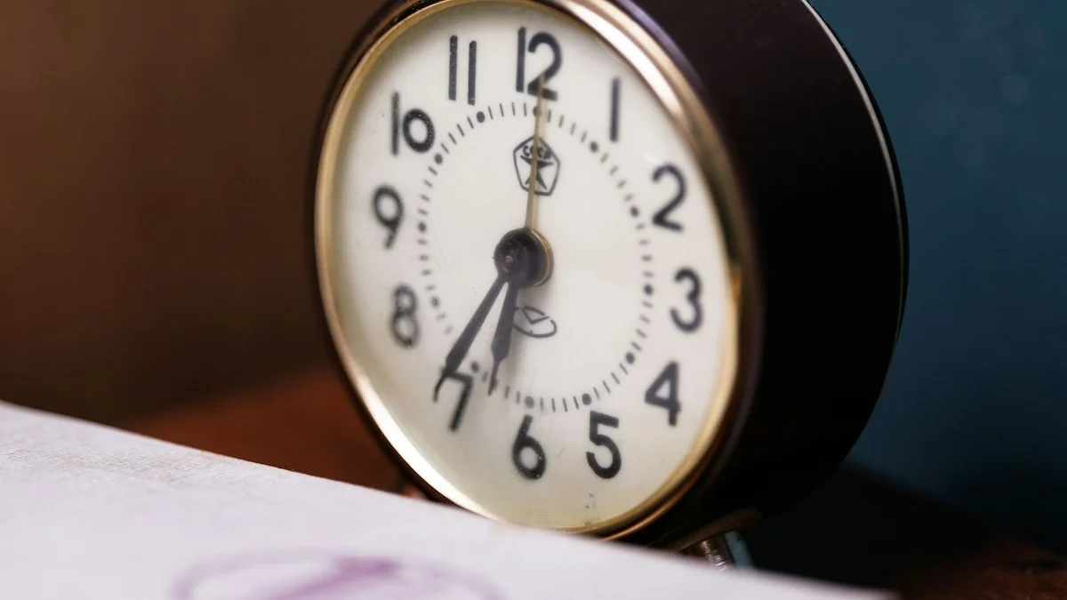 A vintage alarm clock stands on a wooden desk beside a stack of papers. — a The Obsidian Key guide to Print the Seven-Day Sealing Tracker.