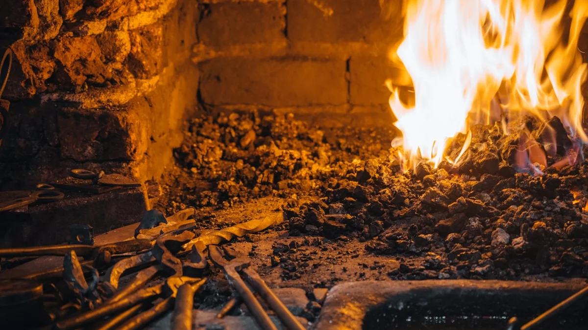 Blacksmith hand tools resting on a workbench beside glowing amber forge embers. — a The Obsidian Key guide to Tested Before Taught: the Culture of the Order.