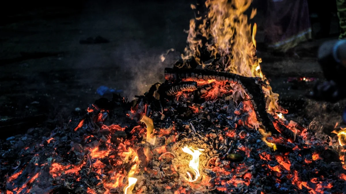 Glowing embers and small flames burn across dark coals at night. — a The Obsidian Key guide to The Clench Self-Check: Seven Signs Your Grip Is Tight.