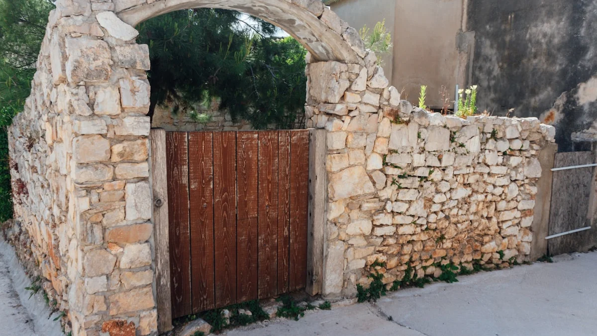 A weathered wooden gate set beneath an ancient stone archway. — a The Obsidian Key guide to The Custodians: Keepers of the Gate Defined.