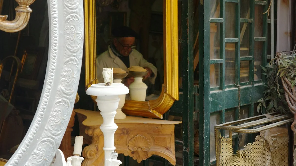 An artisan at work reflected in an ornate gilt mirror among antique frames. — a The Obsidian Key guide to The Ledger of the Hand: Evidence Over Feelings.