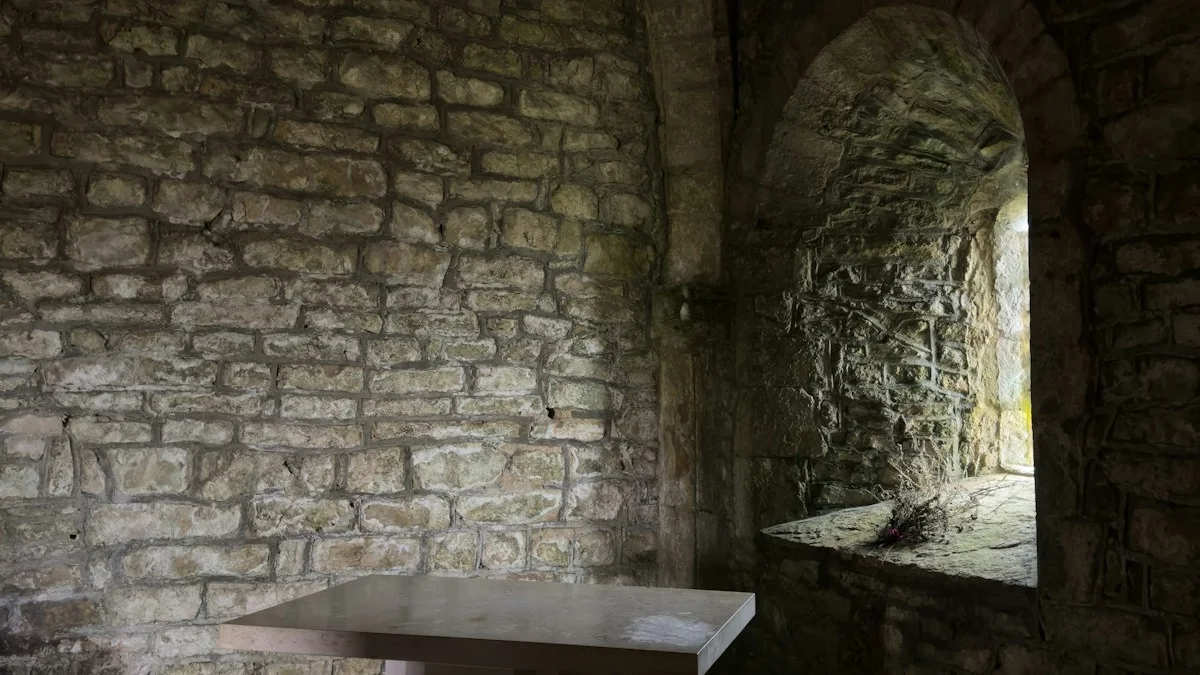 A stone table beside an arched window in an old stone room. — a The Obsidian Key guide to The Still Seat: The Authoring Room Defined.
