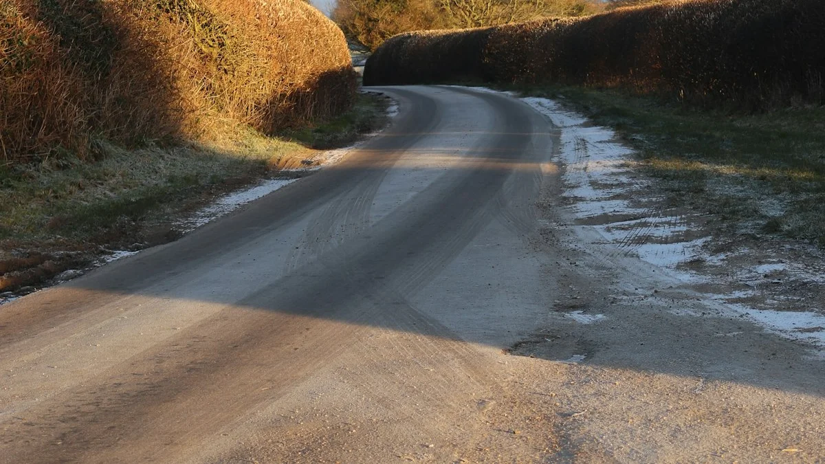 A frosty country road curves between tall hedgerows in pale morning light. — a The Obsidian Key guide to Path Mistakes: Judging the Work on Day Six.