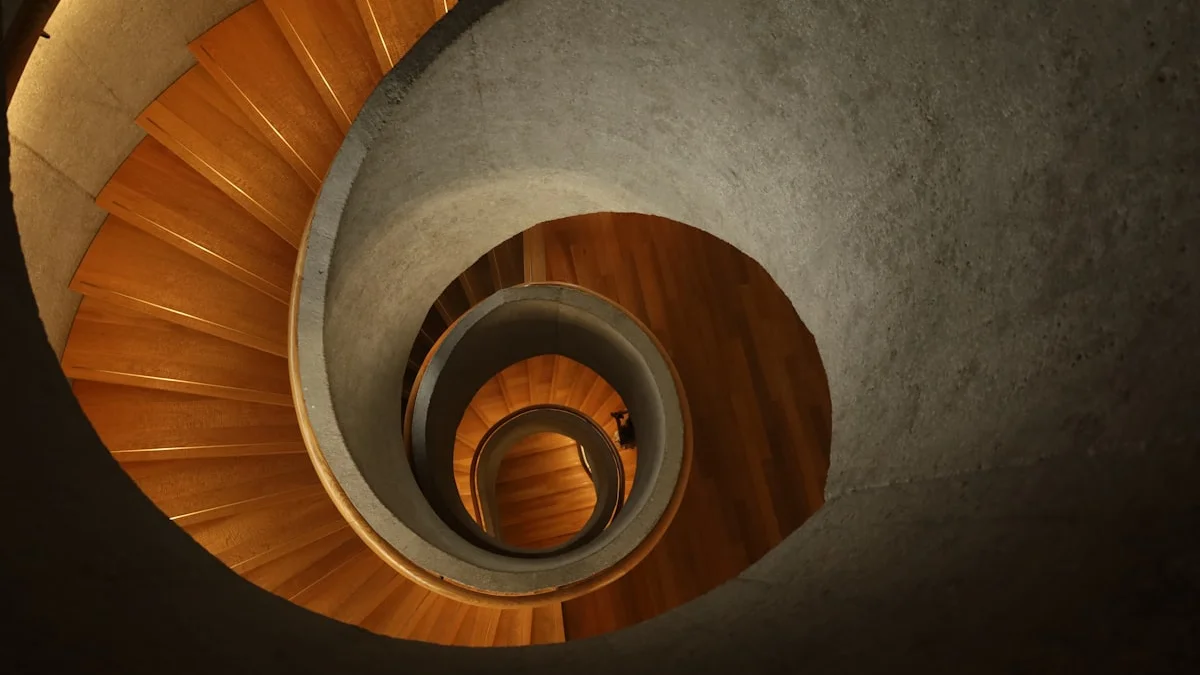 A spiral staircase of warm wooden steps winding down through turning stages. — a The Obsidian Key guide to Wealth Operation Week by Week: Opening to Precipitation.