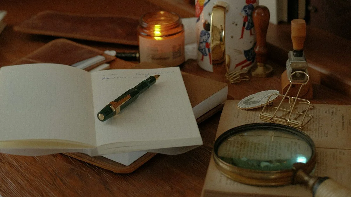 A lit candle burning on a wooden writing desk beside an open journal and a magnifying glass. — a The Obsidian Key guide to What Is the Emotional Signal in the Obsidian Key.