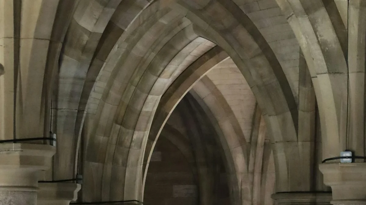 A long vaulted corridor of pale stone arches recedes into shadow. — a The Obsidian Key guide to Who Are the Custodians in the Obsidian Key.