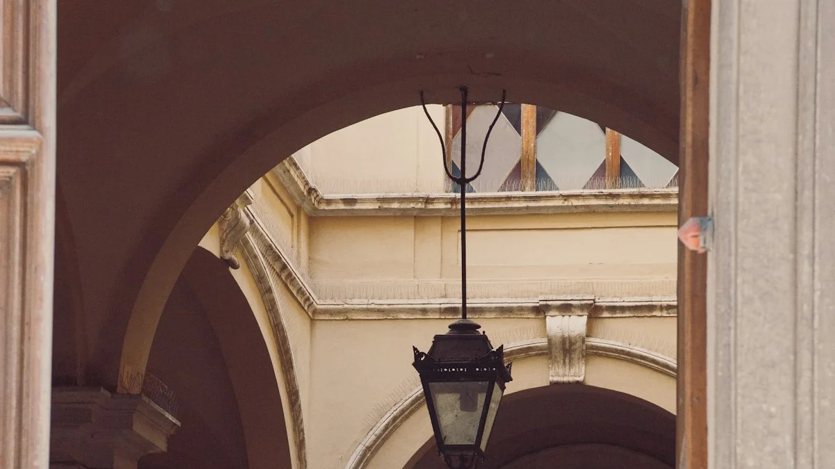 A black lantern hangs in a warm ochre courtyard of layered arches and old doors. — a The Obsidian Key guide to Why the Laws Stand in This Order: The Assembly Sequence.
