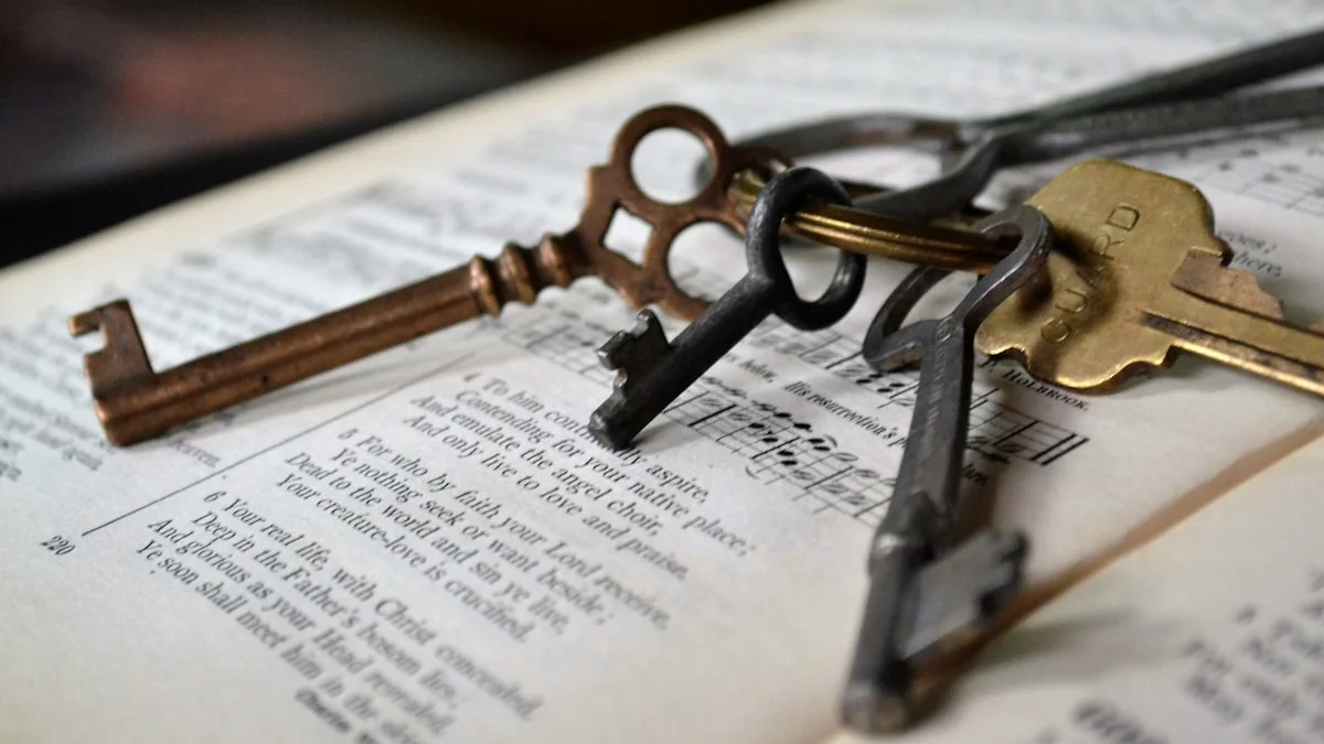 Antique brass and iron keys rest on the open pages of an old book. — a The Obsidian Key guide to Why You Feel Drained After Certain People.